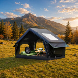 Imagen de una tienda de campaña wildfinder color negro en un paisaje al atardecer